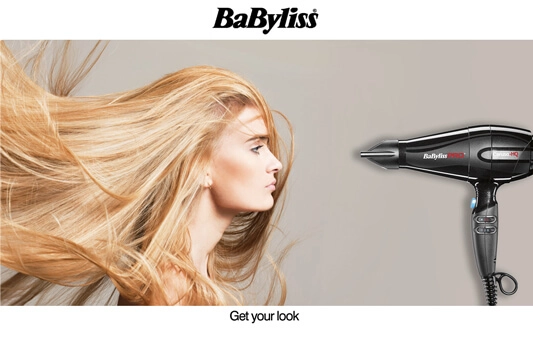 Suszarka Babyliss Caruso HQ suszy włosy pięknej kobiecie